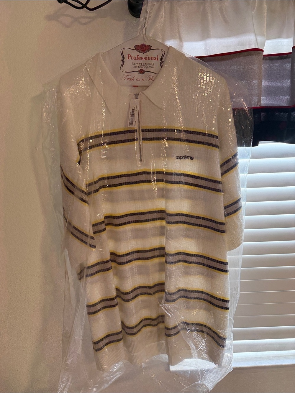 Supreme White Polo with Black and Yellow Stripes